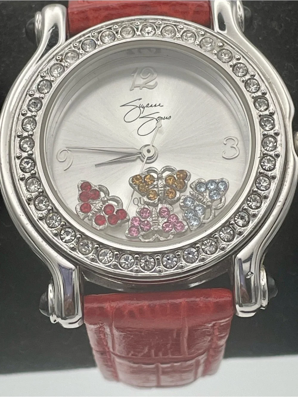 Suzanne Somers Watch with Floating 4 Rhinestone Butterflies. Red Leather Band
